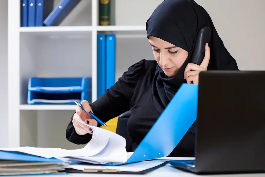 Muslim Office Worker Looking For Document